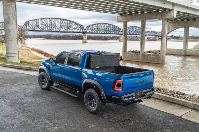 UnderCover Ultra Flex Folding Truck Bed Cover (5.7ft) w/ Multifunction Tailgate: Ram 1500 (19-26)