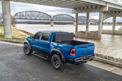UnderCover Ultra Flex Folding Truck Bed Cover (5.7ft) w/ Multifunction Tailgate: Ram 1500 (19-26)