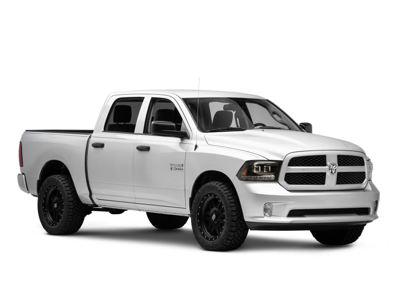Raxiom Black LED Projector Headlights w/ Switchback (F&R): Dodge Ram / Ram 1500 (02-18)
