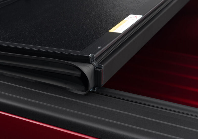 Undercover Flex Folding Bed Cover 6.4ft: Fits Dodge / Ram 1500 / 2500 / 3500 (02-26) - Black