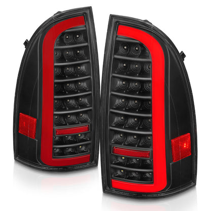 ANZO Full LED Tail Lights w/ Light Bar Sequential Black Housing Clear Lens | Toyota Tacoma (05-15) (311427)