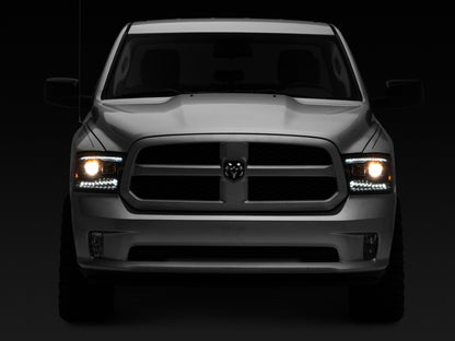 Raxiom Black LED Projector Headlights w/ Switchback (F&R): Dodge Ram / Ram 1500 (02-18)