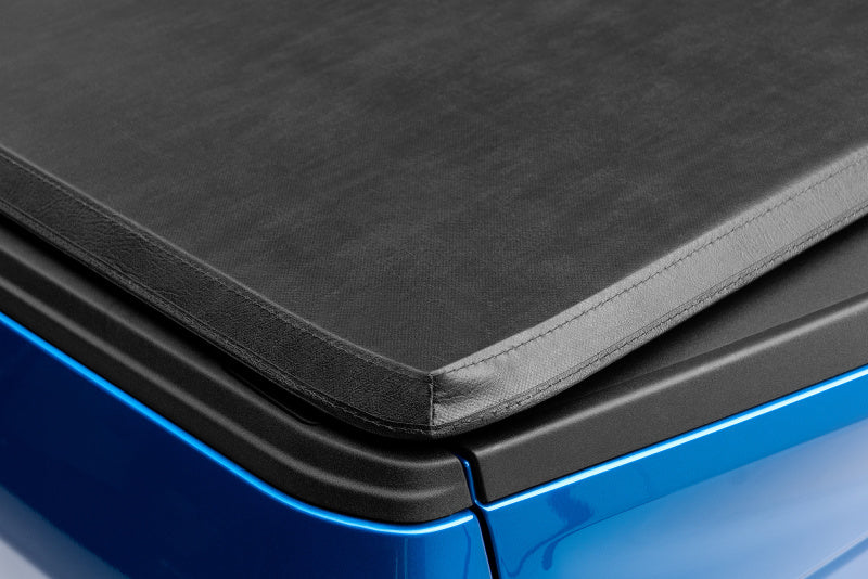 Lund Genesis Tri-Fold Tonneau Cover | Toyota Tacoma (16-23 / 20-23) 5ft Bed (950186)