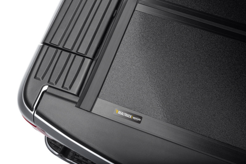 UnderCover Armor Flex Hard Folding Bed Cover 5.7ft w/ Rambox: Fits Most Ram 1500 Models (2019-2026)