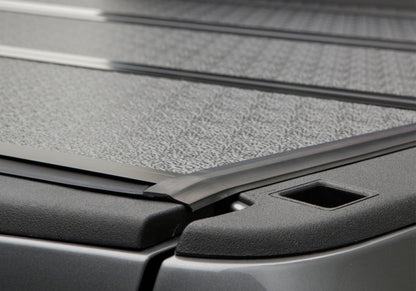 Undercover Flex Folding Bed Cover 6.4ft: Fits Dodge / Ram 1500 / 2500 / 3500 (02-26) - Black