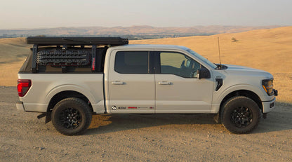 Rally Armor UR Black Mud Flaps | Ford F-150 (21-23) / F-150 (24-26) (MF115-UR-BLK-MBK)