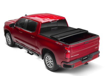 Lund Genesis Tri-Fold Tonneau Cover | Chevrolet Silverado 1500 / GMC Sierra 1500 (19-26) / Silverado ZR2 / Sierra AT4 / AT4X (22-26) (950292)