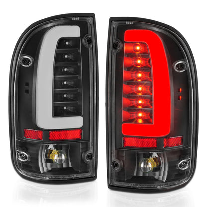 ANZO LED Tail Light Assembly Black Housing Clear Lens Rear Pair | Toyota Tacoma (95-04) (311353)