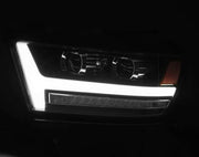 AlphaRex 19-20 Ram 1500HD PRO-Series Proj Headlight Plnk Style Blk w/Activ Light/Seq Signal/Plnk DRL Lights offroad accessory | Iron Ridge Offroad
