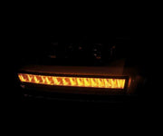 AlphaRex 19-20 Ram 1500HD PRO-Series Proj Headlight Plnk Style Blk w/Activ Light/Seq Signal/Plnk DRL Lights offroad accessory | Iron Ridge Offroad