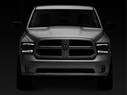 Raxiom Black LED Projector Headlights w/ Switchback (F&R): Dodge Ram / Ram 1500 (02-18)