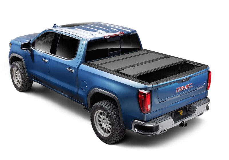 BAK 19-21 GMC Sierra 1500 (Carbon Pro Bed) 5ft 8in Bed BAKFlip MX4 Matte Finish | GMC Sierra 1500 (19-26), Sierra AT4 (22-26), Sierra AT4X (22-26) Tonneau Covers offroad accessory | Iron Ridge Offroad