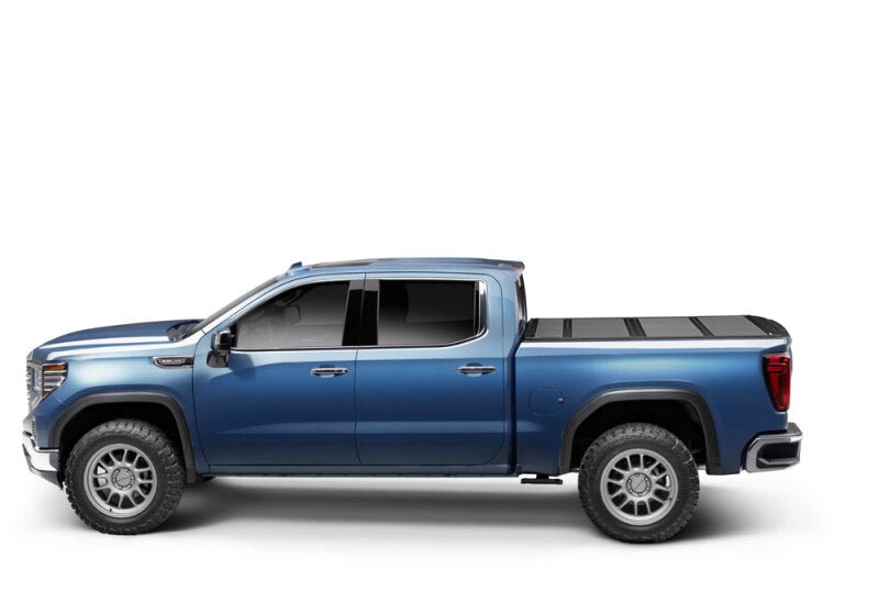 BAK 19-21 GMC Sierra 1500 (Carbon Pro Bed) 5ft 8in Bed BAKFlip MX4 Matte Finish | GMC Sierra 1500 (19-26), Sierra AT4 (22-26), Sierra AT4X (22-26) Tonneau Covers offroad accessory | Iron Ridge Offroad