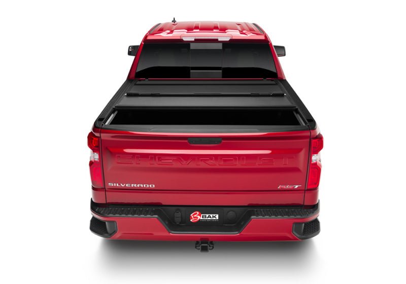 BAK 19-21 GMC Sierra 1500 (Carbon Pro Bed) 5ft 8in Bed BAKFlip MX4 Matte Finish | GMC Sierra 1500 (19-26), Sierra AT4 (22-26), Sierra AT4X (22-26) Tonneau Covers offroad accessory | Iron Ridge Offroad