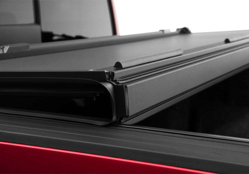 BAK 19-21 GMC Sierra 1500 (Carbon Pro Bed) 5ft 8in Bed BAKFlip MX4 Matte Finish | GMC Sierra 1500 (19-26), Sierra AT4 (22-26), Sierra AT4X (22-26) Tonneau Covers offroad accessory | Iron Ridge Offroad