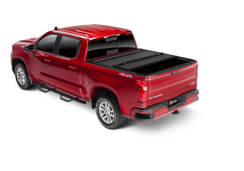 BAK 19-21 GMC Sierra 1500 (Carbon Pro Bed) 5ft 8in Bed BAKFlip MX4 Matte Finish | GMC Sierra 1500 (19-26), Sierra AT4 (22-26), Sierra AT4X (22-26) Tonneau Covers offroad accessory | Iron Ridge Offroad