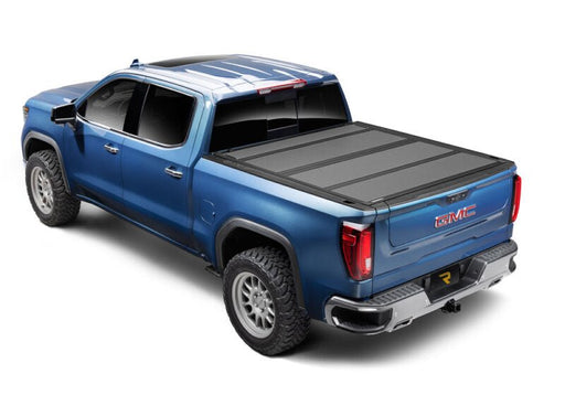 BAK 5ft 8in Bed BAKFlip MX4 Matte Finish | Chevrolet Silverado 1500/2500/3500 (19-26) / GMC Sierra 1500 (19-26) (448120) Tonneau Covers offroad accessory | Iron Ridge Offroad