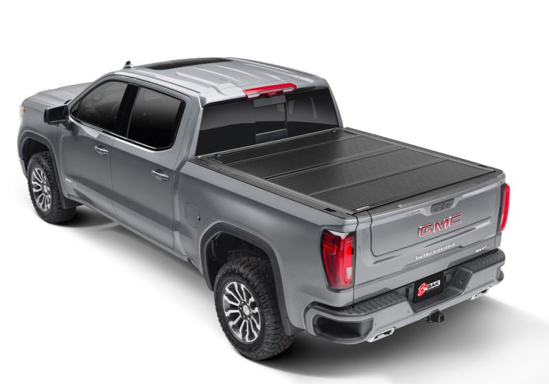 BAK F1 Hard Folding Tonneau Cover | Chevrolet Silverado 1500 (19-26) / ZR2 (22-26) / GMC Sierra AT4 (22-26) / AT4X (22-26) (772130) Tonneau Covers offroad accessory | Iron Ridge Offroad