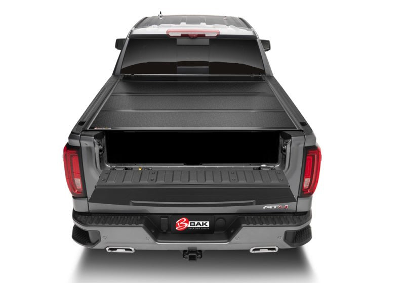 BAK F1 Hard Folding Tonneau Cover | Chevrolet Silverado 1500 (19-26) / ZR2 (22-26) / GMC Sierra AT4 (22-26) / AT4X (22-26) (772130) Tonneau Covers offroad accessory | Iron Ridge Offroad