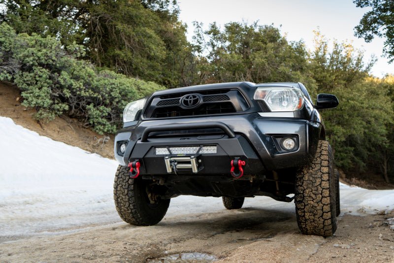 Body Armor 4x4 12-15 Toyota Tacoma HiLine Front Winch Bumper | Toyota Tacoma (12-15) (TC-19340) Bumpers, Grilles & Guards offroad accessory | Iron Ridge Offroad