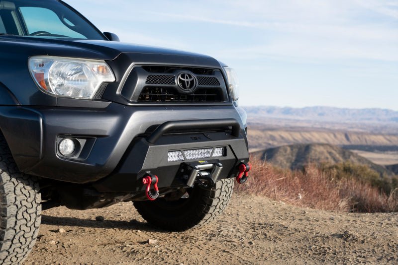 Body Armor 4x4 12-15 Toyota Tacoma HiLine Front Winch Bumper | Toyota Tacoma (12-15) (TC-19340) Bumpers, Grilles & Guards offroad accessory | Iron Ridge Offroad