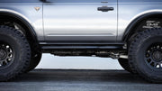 DV8 Offroad 21 - 23 Ford Bronco OE Plus 2 - Door Side Steps Nerf Bars & Running Boards offroad accessory | Iron Ridge Offroad