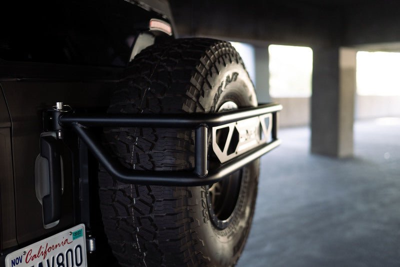 DV8 Offroad 21 - 23 Ford Bronco Spare Tire Guard & Accessory Mount Winches & Hitches offroad accessory | Iron Ridge Offroad