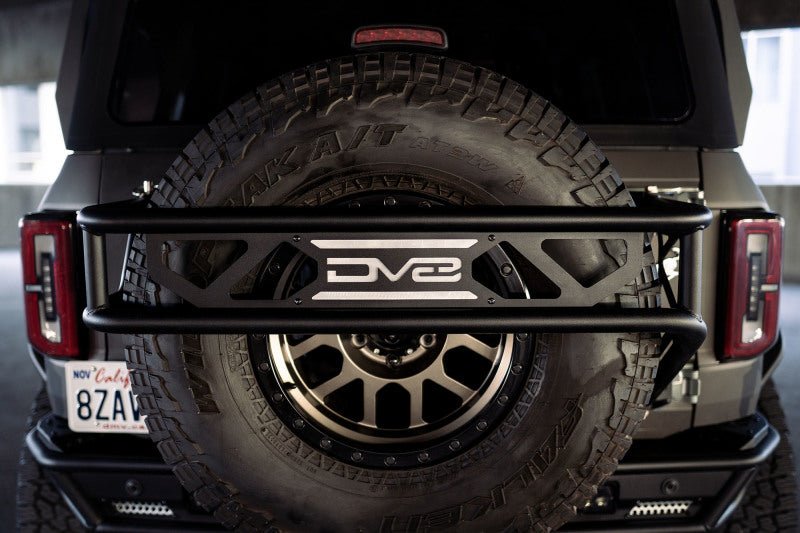 DV8 Offroad 21 - 23 Ford Bronco Spare Tire Guard & Accessory Mount Winches & Hitches offroad accessory | Iron Ridge Offroad