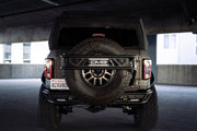 DV8 Offroad 21 - 23 Ford Bronco Spare Tire Guard & Accessory Mount Winches & Hitches offroad accessory | Iron Ridge Offroad