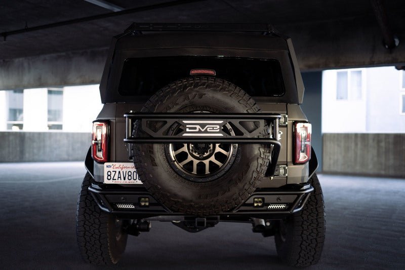 DV8 Offroad 21 - 23 Ford Bronco Spare Tire Guard & Accessory Mount Winches & Hitches offroad accessory | Iron Ridge Offroad