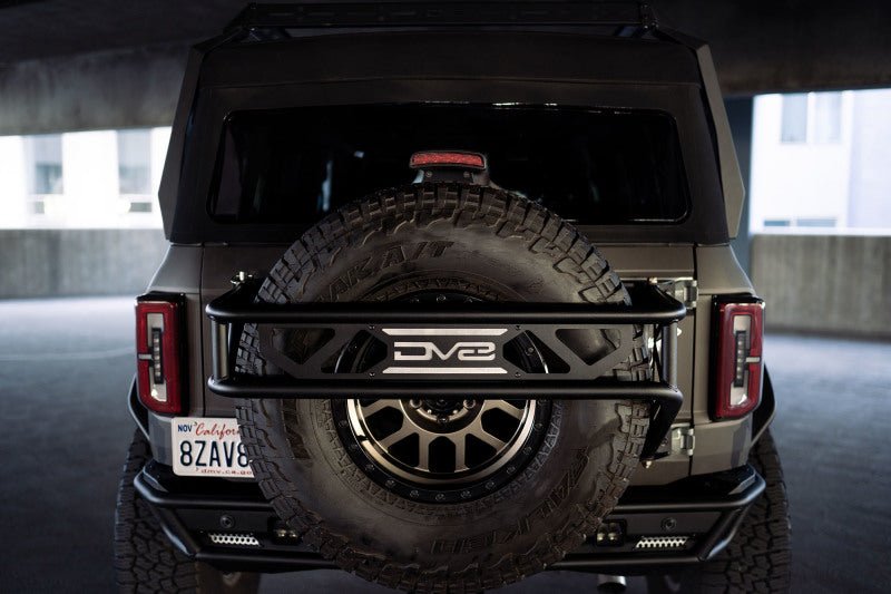 DV8 Offroad 21 - 23 Ford Bronco Spare Tire Guard & Accessory Mount Winches & Hitches offroad accessory | Iron Ridge Offroad