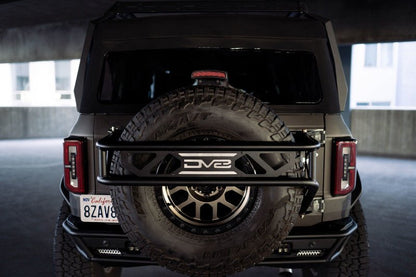 DV8 Offroad 21 - 23 Ford Bronco Spare Tire Guard & Accessory Mount Winches & Hitches offroad accessory | Iron Ridge Offroad