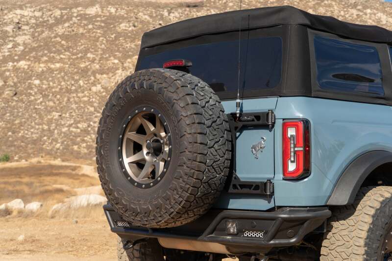 DV8 Offroad 21 - 24 Ford Bronco Tire Carrier Roofs & Roof Accessories offroad accessory | Iron Ridge Offroad
