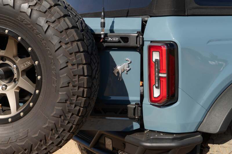 DV8 Offroad 21 - 24 Ford Bronco Tire Carrier Roofs & Roof Accessories offroad accessory | Iron Ridge Offroad