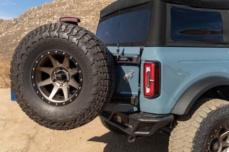 DV8 Offroad 21 - 24 Ford Bronco Tire Carrier Roofs & Roof Accessories offroad accessory | Iron Ridge Offroad