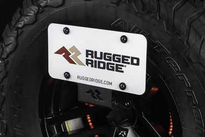 Rugged Ridge Tag Relocation Bracket Rear | Jeep Wrangler JL (18-25) / JK (07-18)