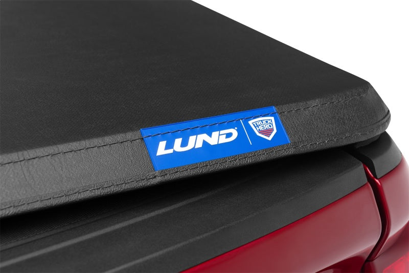 Lund Genesis Tri-Fold Tonneau Cover | Chevrolet Silverado 1500 / GMC Sierra 1500 (19-26) / Silverado ZR2 / Sierra AT4 / AT4X (22-26) (950292)