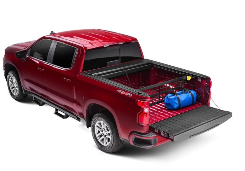 Roll-N-Lock Cargo Manager | Chevrolet Silverado 1500 / ZR2 (19-26) / GMC Sierra 1500 / AT4 / AT4X (19-26) (CM223) Truck Bed Accessories offroad accessory | Iron Ridge Offroad