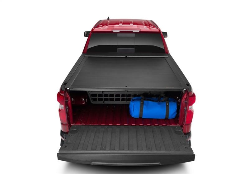 Roll-N-Lock Cargo Manager | Chevrolet Silverado 1500 / ZR2 (19-26) / GMC Sierra 1500 / AT4 / AT4X (19-26) (CM223) Truck Bed Accessories offroad accessory | Iron Ridge Offroad